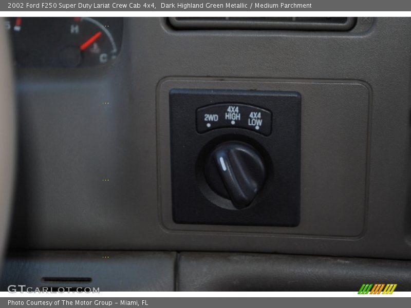 Dark Highland Green Metallic / Medium Parchment 2002 Ford F250 Super Duty Lariat Crew Cab 4x4