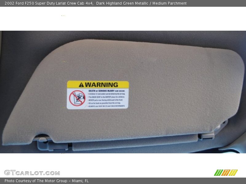 Dark Highland Green Metallic / Medium Parchment 2002 Ford F250 Super Duty Lariat Crew Cab 4x4