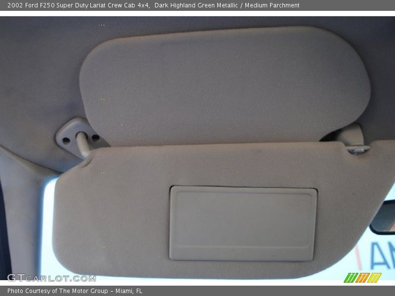 Dark Highland Green Metallic / Medium Parchment 2002 Ford F250 Super Duty Lariat Crew Cab 4x4