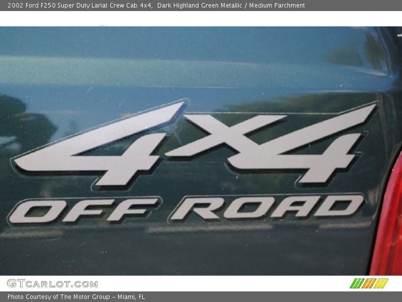 Dark Highland Green Metallic / Medium Parchment 2002 Ford F250 Super Duty Lariat Crew Cab 4x4