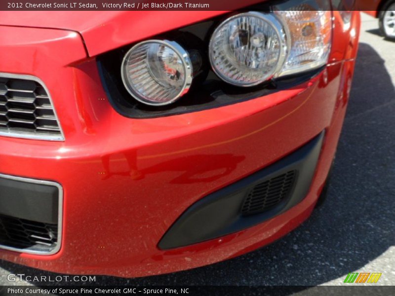 Victory Red / Jet Black/Dark Titanium 2012 Chevrolet Sonic LT Sedan