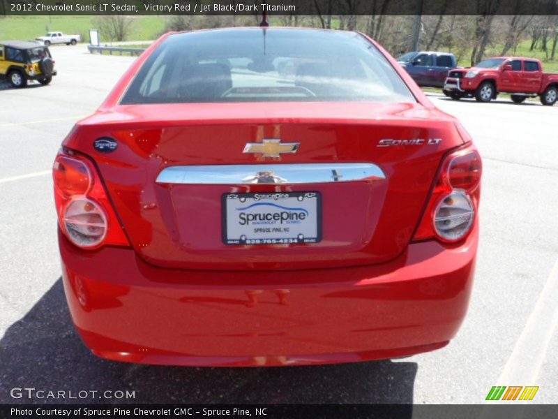 Victory Red / Jet Black/Dark Titanium 2012 Chevrolet Sonic LT Sedan