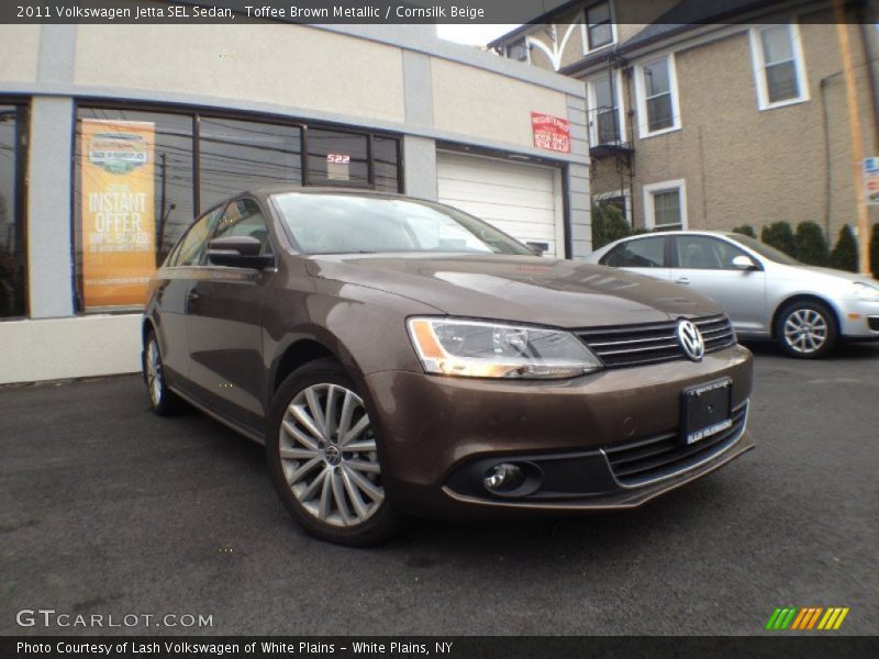 Toffee Brown Metallic / Cornsilk Beige 2011 Volkswagen Jetta SEL Sedan