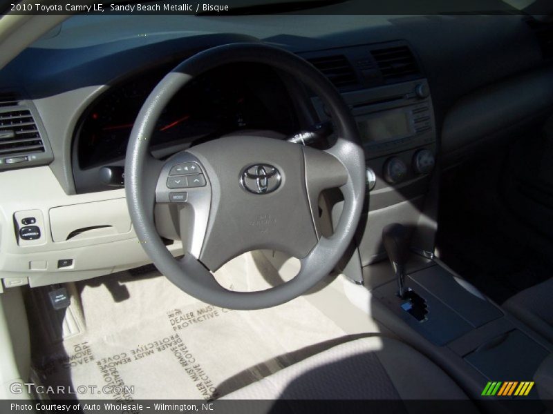 Sandy Beach Metallic / Bisque 2010 Toyota Camry LE