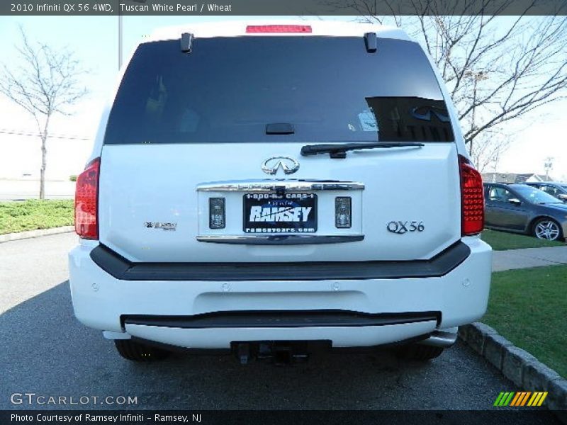 Tuscan White Pearl / Wheat 2010 Infiniti QX 56 4WD