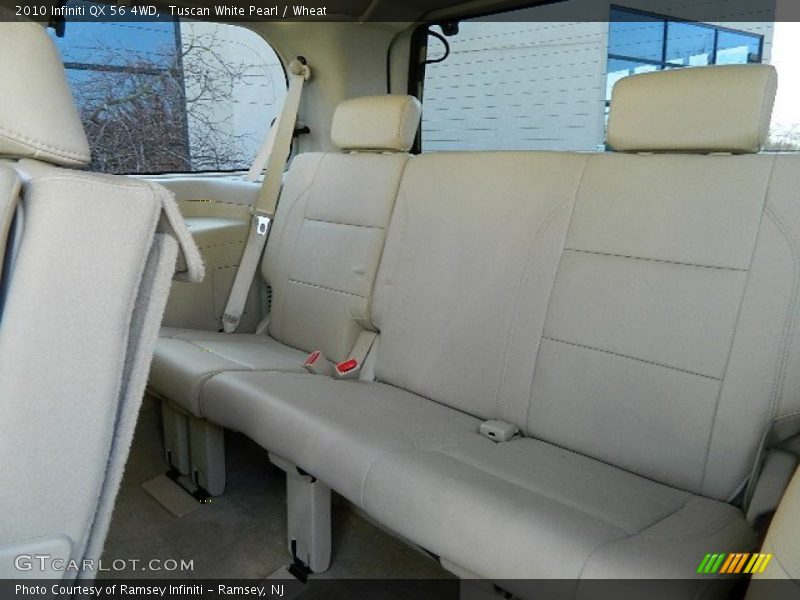 Tuscan White Pearl / Wheat 2010 Infiniti QX 56 4WD