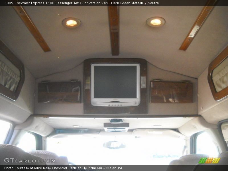 Dark Green Metallic / Neutral 2005 Chevrolet Express 1500 Passenger AWD Conversion Van