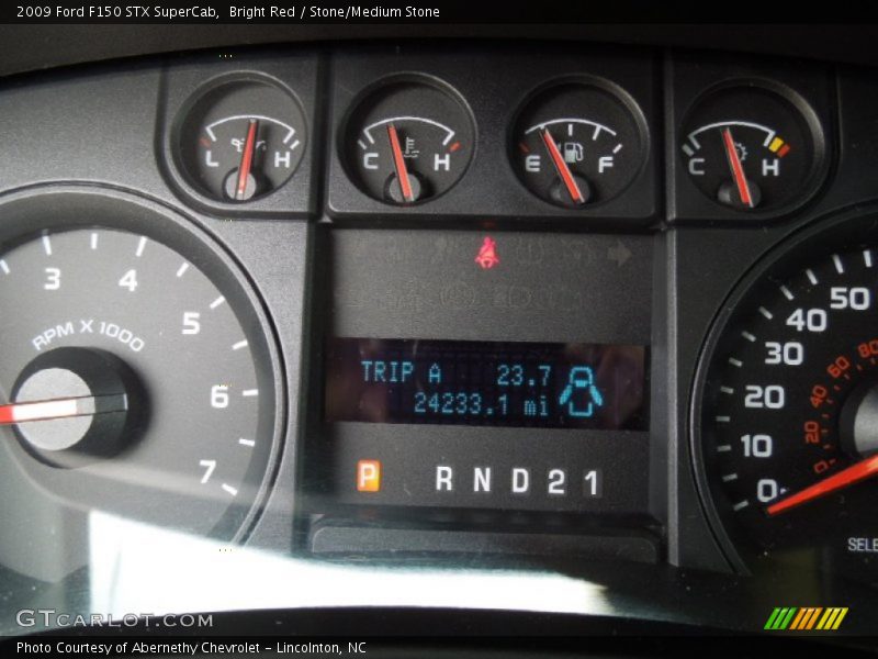 Bright Red / Stone/Medium Stone 2009 Ford F150 STX SuperCab