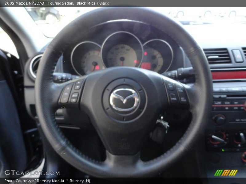 Black Mica / Black 2009 Mazda MAZDA3 i Touring Sedan