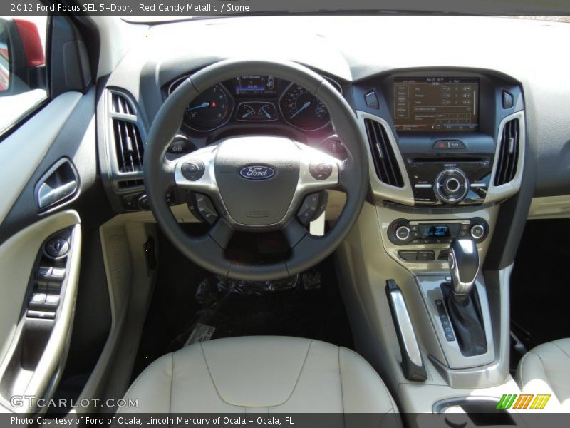 Red Candy Metallic / Stone 2012 Ford Focus SEL 5-Door