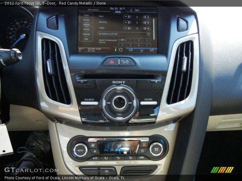 Red Candy Metallic / Stone 2012 Ford Focus SEL 5-Door