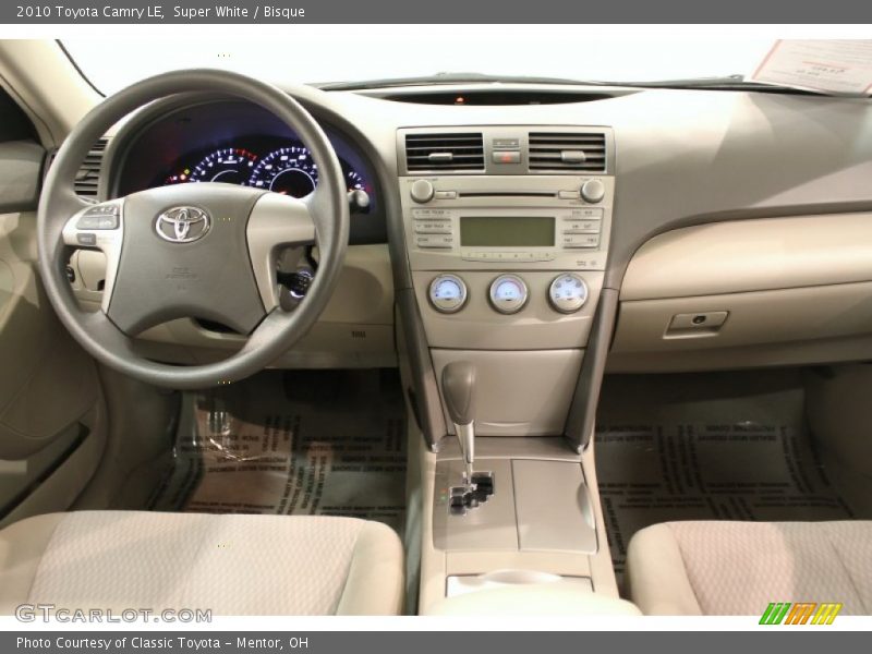 Super White / Bisque 2010 Toyota Camry LE