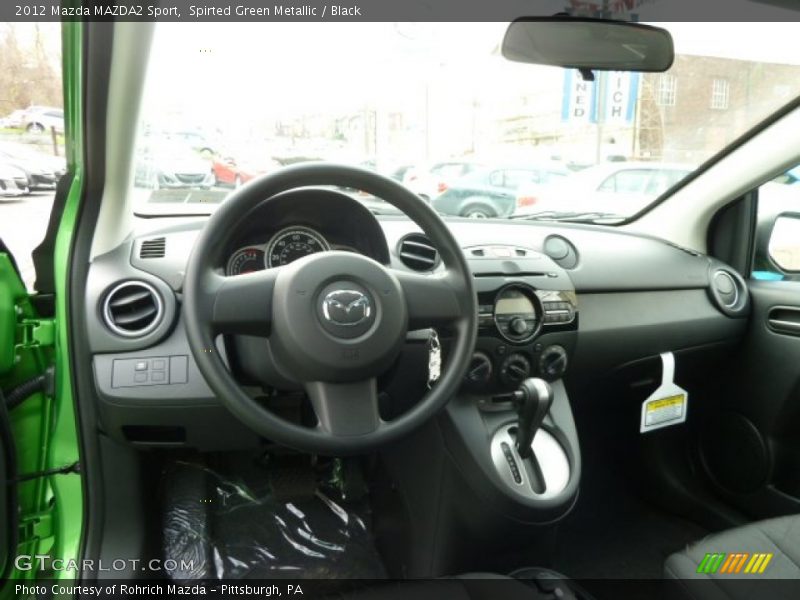 Dashboard of 2012 MAZDA2 Sport