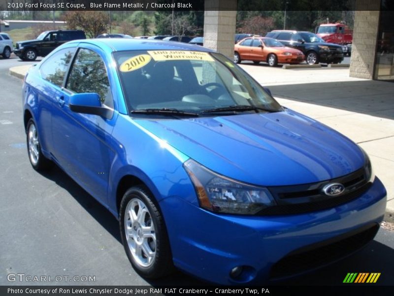 Blue Flame Metallic / Charcoal Black 2010 Ford Focus SE Coupe