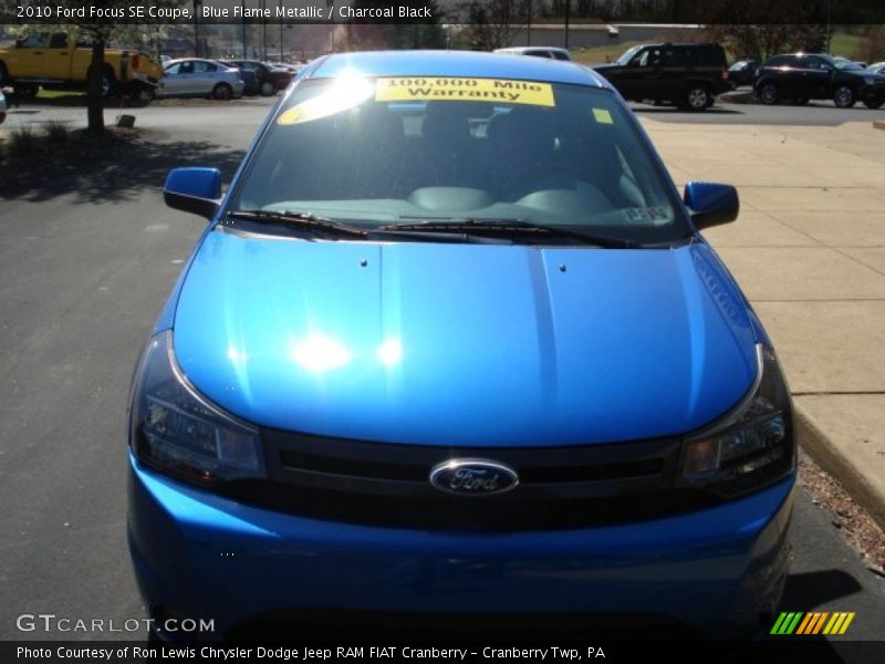 Blue Flame Metallic / Charcoal Black 2010 Ford Focus SE Coupe