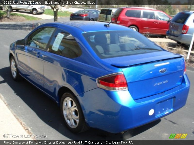 Blue Flame Metallic / Charcoal Black 2010 Ford Focus SE Coupe