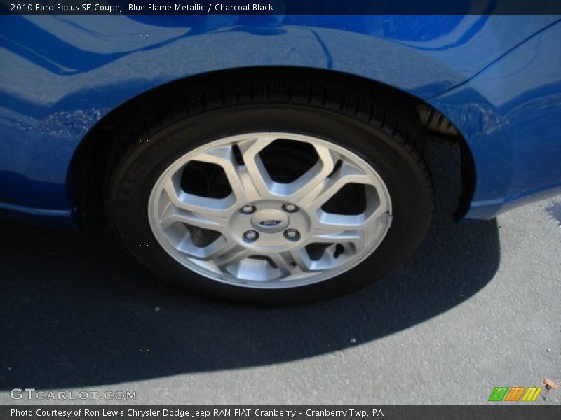 Blue Flame Metallic / Charcoal Black 2010 Ford Focus SE Coupe