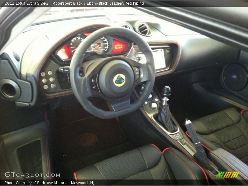  2012 Evora S 2+2 Ebony Black Leather/Red Piping Interior