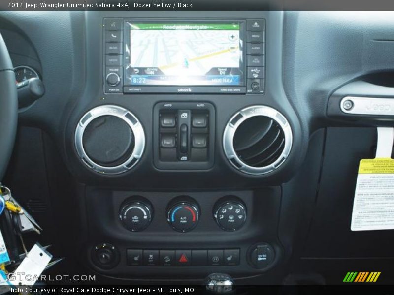 Dozer Yellow / Black 2012 Jeep Wrangler Unlimited Sahara 4x4