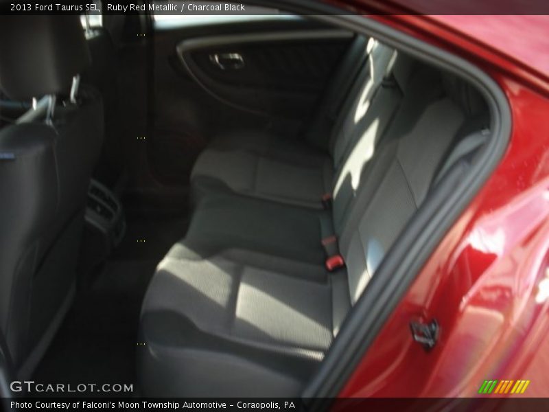 Ruby Red Metallic / Charcoal Black 2013 Ford Taurus SEL