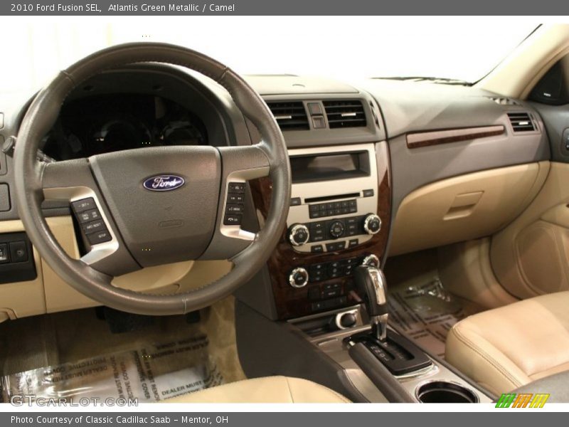 Atlantis Green Metallic / Camel 2010 Ford Fusion SEL