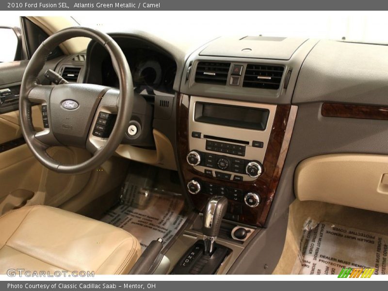 Atlantis Green Metallic / Camel 2010 Ford Fusion SEL