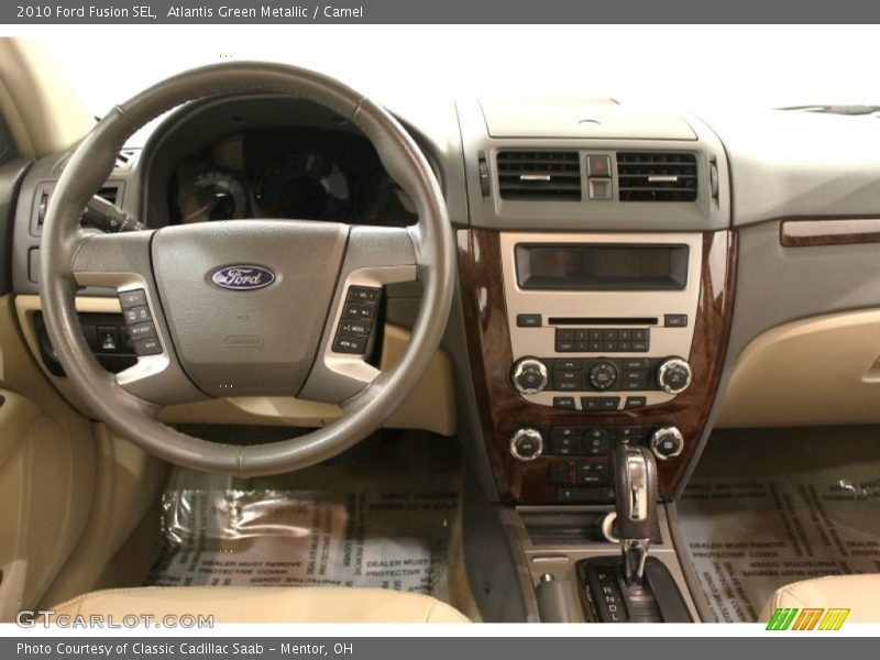 Atlantis Green Metallic / Camel 2010 Ford Fusion SEL