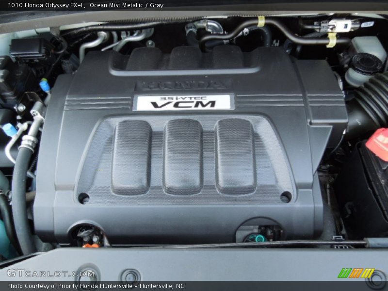 Ocean Mist Metallic / Gray 2010 Honda Odyssey EX-L
