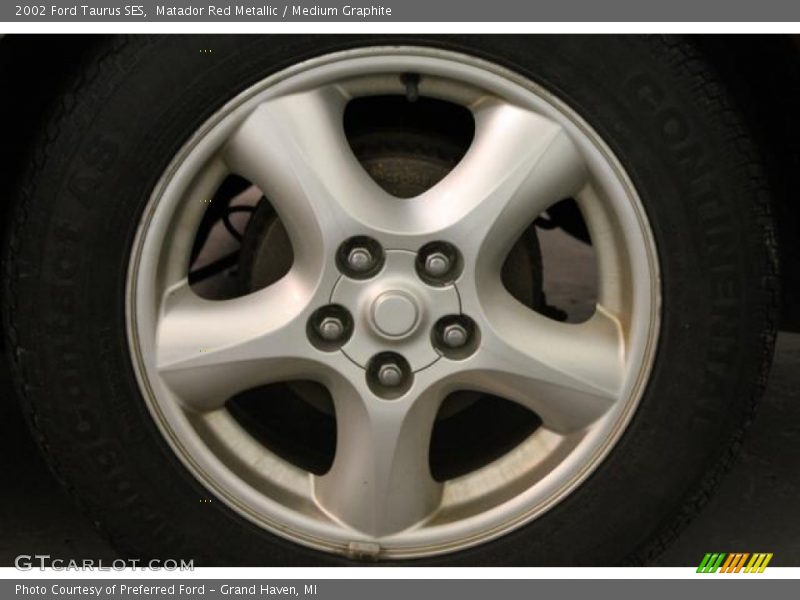 Matador Red Metallic / Medium Graphite 2002 Ford Taurus SES