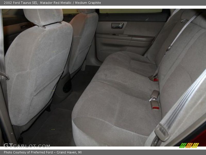 Matador Red Metallic / Medium Graphite 2002 Ford Taurus SES