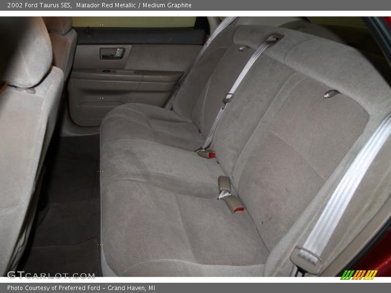 Matador Red Metallic / Medium Graphite 2002 Ford Taurus SES