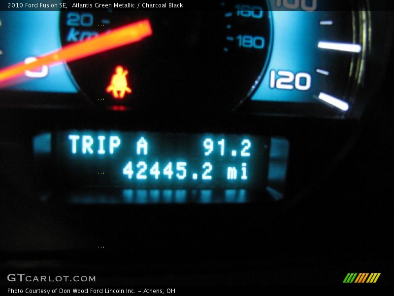 Atlantis Green Metallic / Charcoal Black 2010 Ford Fusion SE