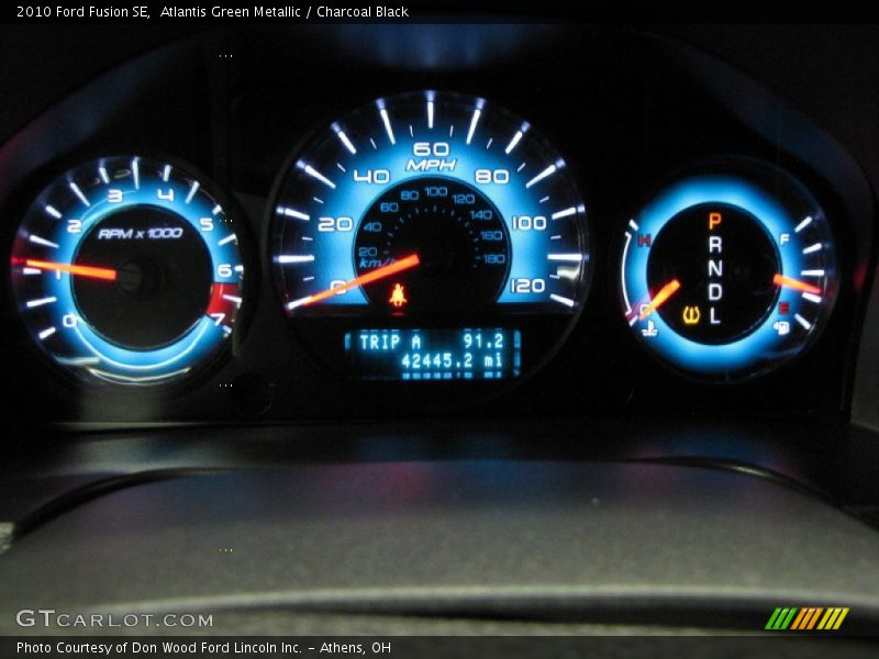 Atlantis Green Metallic / Charcoal Black 2010 Ford Fusion SE