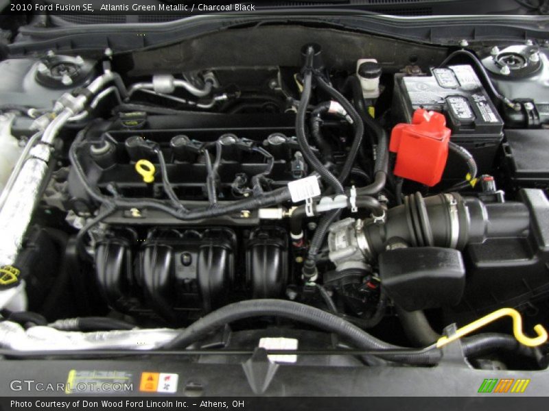 Atlantis Green Metallic / Charcoal Black 2010 Ford Fusion SE