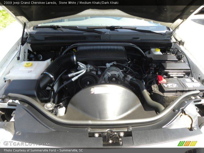 Stone White / Medium Khaki/Dark Khaki 2009 Jeep Grand Cherokee Laredo