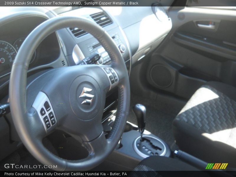 Sunlight Copper Metallic / Black 2009 Suzuki SX4 Crossover Technology AWD