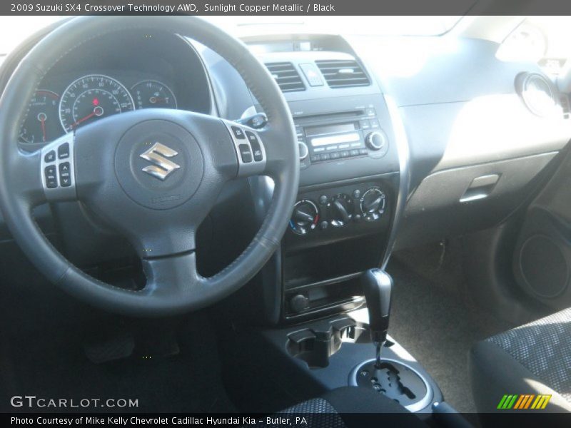 Sunlight Copper Metallic / Black 2009 Suzuki SX4 Crossover Technology AWD