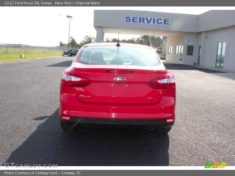 Race Red / Charcoal Black 2012 Ford Focus SEL Sedan
