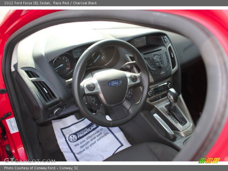 Race Red / Charcoal Black 2012 Ford Focus SEL Sedan