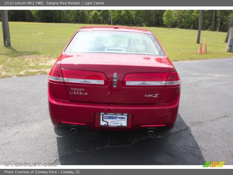 Sangria Red Metallic / Light Camel 2010 Lincoln MKZ FWD