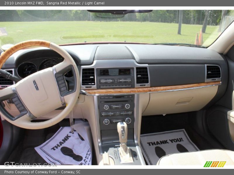 Sangria Red Metallic / Light Camel 2010 Lincoln MKZ FWD