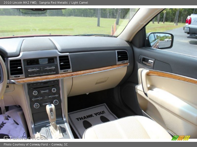 Sangria Red Metallic / Light Camel 2010 Lincoln MKZ FWD