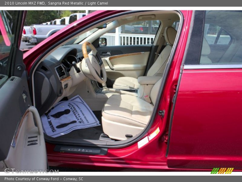 Sangria Red Metallic / Light Camel 2010 Lincoln MKZ FWD