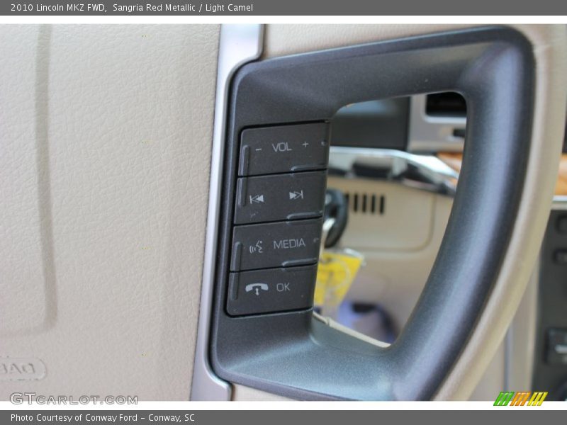 Sangria Red Metallic / Light Camel 2010 Lincoln MKZ FWD