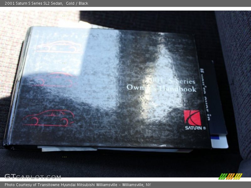 Gold / Black 2001 Saturn S Series SL2 Sedan