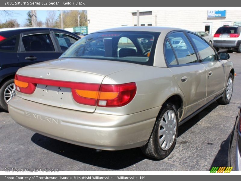 Gold / Black 2001 Saturn S Series SL2 Sedan