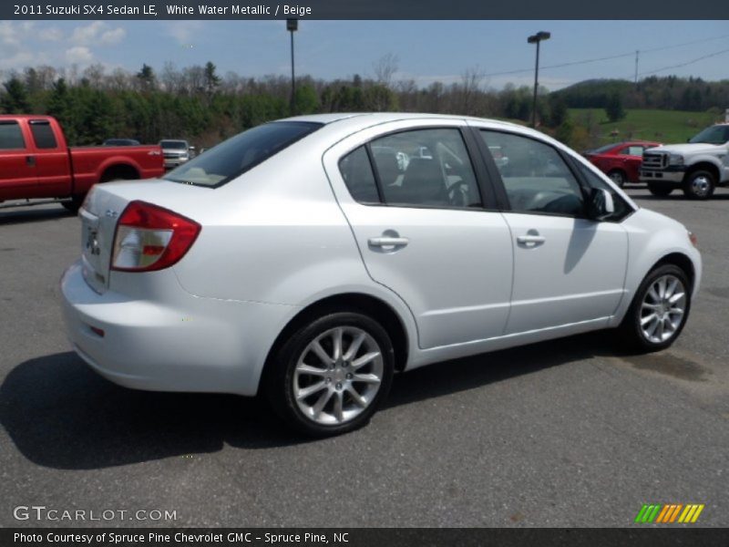 White Water Metallic / Beige 2011 Suzuki SX4 Sedan LE