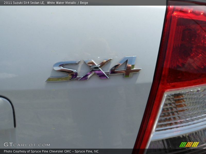 White Water Metallic / Beige 2011 Suzuki SX4 Sedan LE