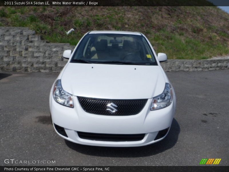 White Water Metallic / Beige 2011 Suzuki SX4 Sedan LE