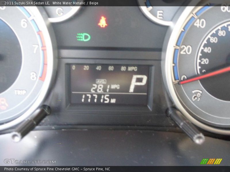 White Water Metallic / Beige 2011 Suzuki SX4 Sedan LE